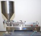 Used Wenzhou Rigao Table Top Semi Automatic Piston Filler, Model DYF. 316L Stainless steel product contact. Filling speed 5 to 20 bottles per minute. Filling accuracy /= 1% +/-. Filling range: approx...